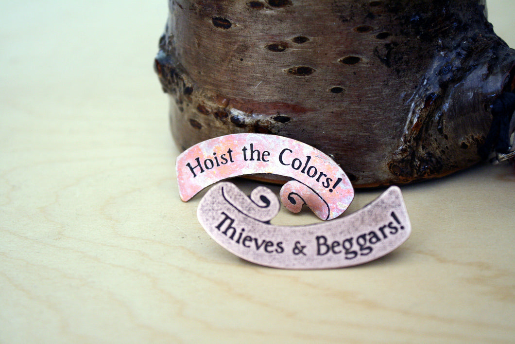 Hoist the Colors / Thieves and Beggars Pin Set