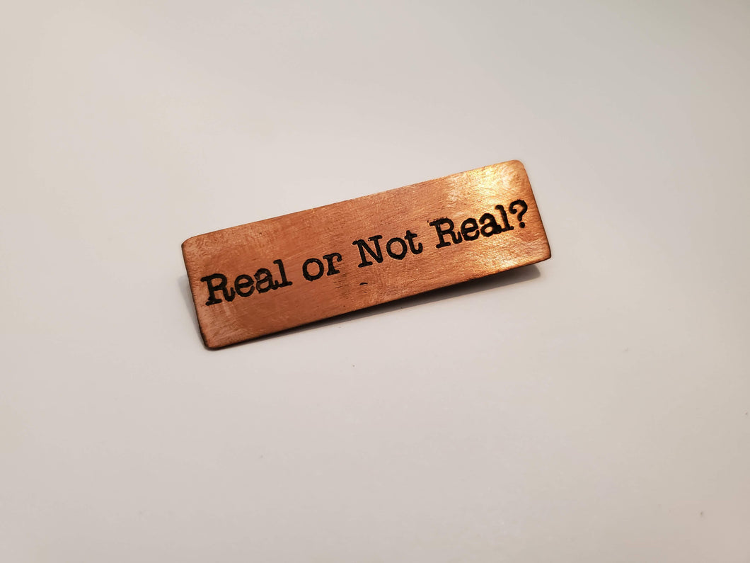 Real or not real - Pin
