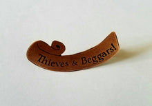 Thieves and Beggars Medallion Pin